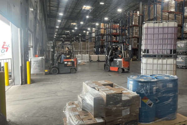 A warehouse image shows regulatory compliance